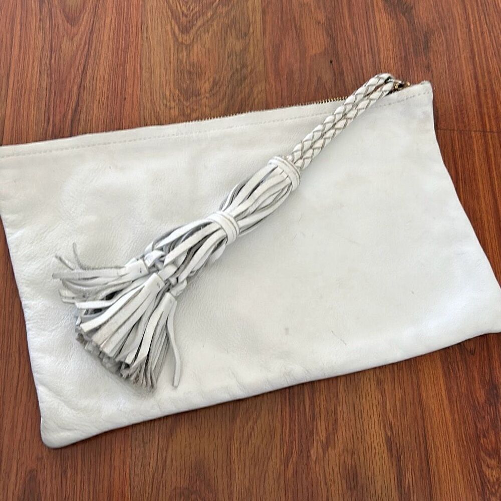 Jennifer Haley white leather clutch handbag with large tassel